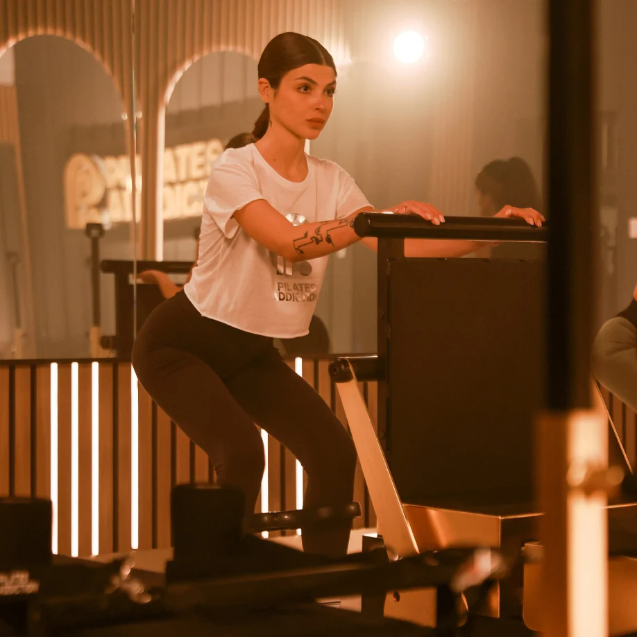 Pilates Addiction member training on the AURUM Reformer