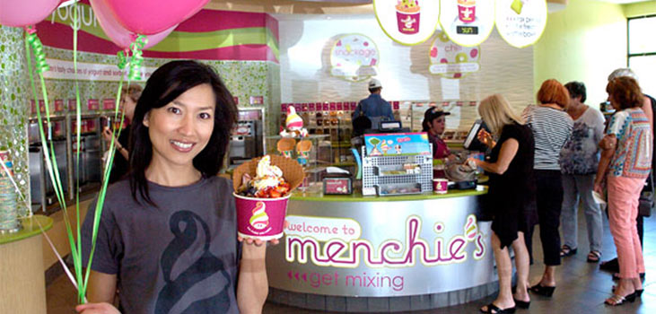 Menchie's franchise owner in a frozen yogurt store