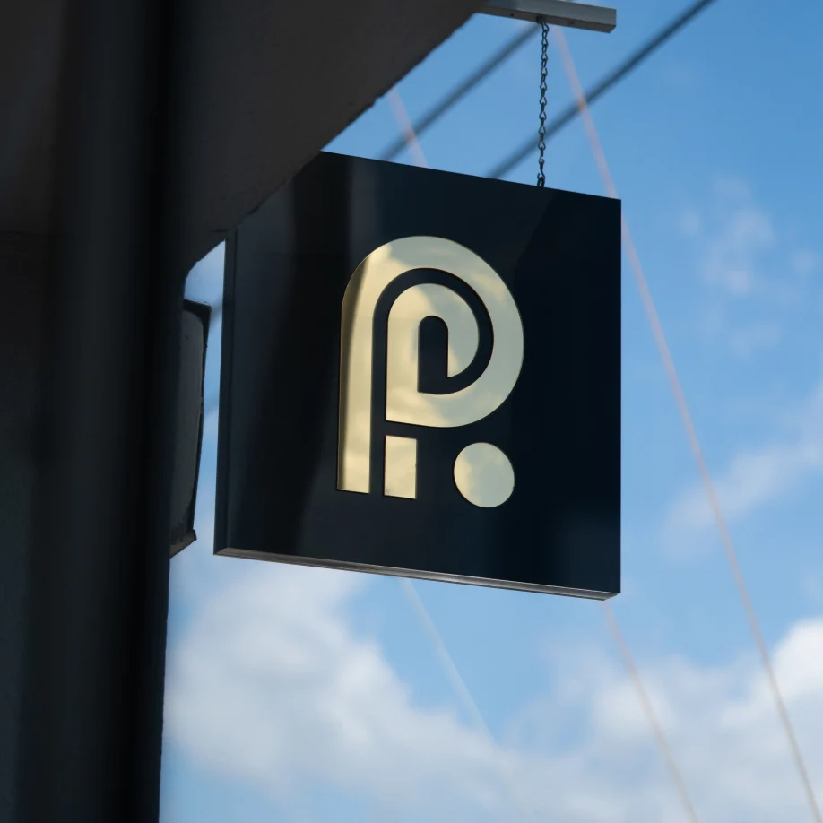 Pilates Addiction exterior sign with the brand mark